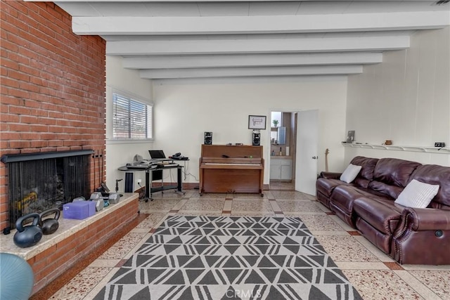 9513 Rex Rd, Pico Rivera, CA 90660 - living area featuring a brick fireplace, beamed ceiling, and a desk