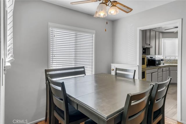 9513 Rex Rd, Pico Rivera, CA 90660 - dining space with ceiling fan