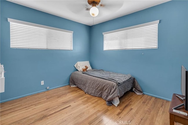 9513 Rex Rd, Pico Rivera, CA 90660 - bedroom with wood finished floors and ceiling fan