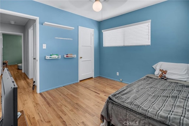 9513 Rex Rd, Pico Rivera, CA 90660 - bedroom featuring light wood-style flooring and ceiling fan
