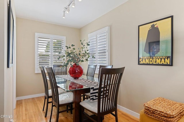 324 N J St, Oxnard, CA 93030 - dining room featuring light wood-style floors and track lighting