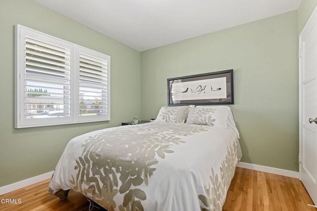 324 N J St, Oxnard, CA 93030 - bedroom with baseboards and wood finished floors