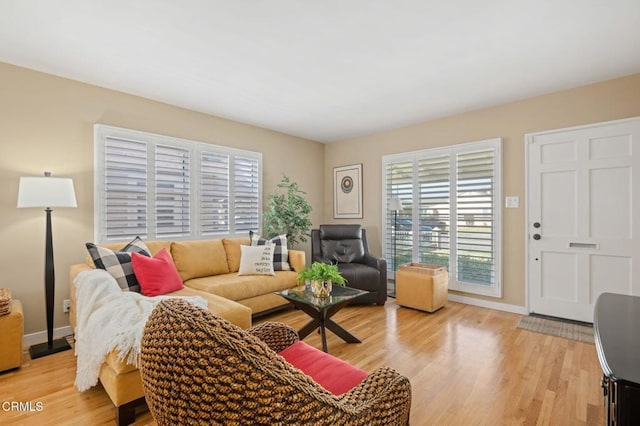 324 N J St, Oxnard, CA 93030 - living area with light wood finished floors
