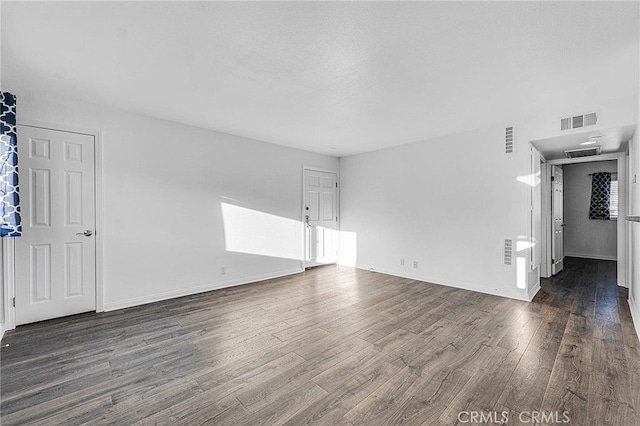 5224 Denny Ave Unit 209, North Hollywood, CA 91601 - unfurnished living room with dark wood finished floors and baseboards