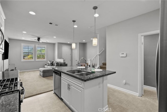 2894 E Via Fiano, Ontario, CA 91764 - kitchen featuring stainless steel appliances, white cabinets, a ceiling fan, recessed lighting, and open floor plan