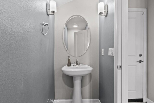 2894 E Via Fiano, Ontario, CA 91764 - bathroom featuring baseboards