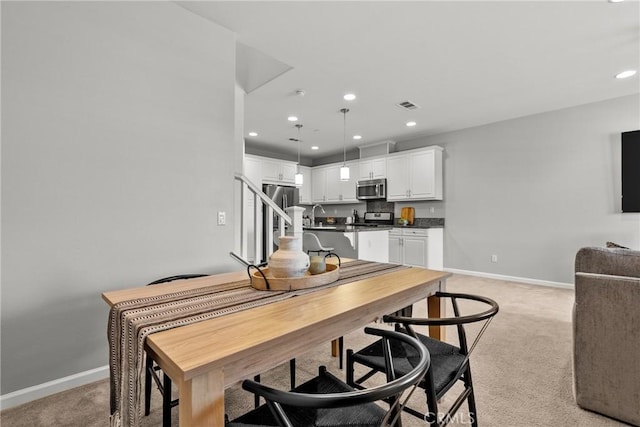2894 E Via Fiano, Ontario, CA 91764 - dining area featuring light carpet and recessed lighting