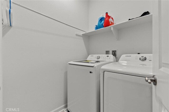2894 E Via Fiano, Ontario, CA 91764 - laundry area featuring independent washer and dryer and baseboards