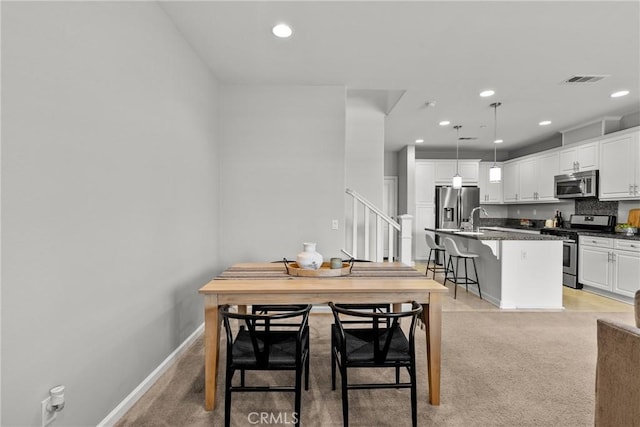 2894 E Via Fiano, Ontario, CA 91764 - dining area featuring light colored carpet and recessed lighting
