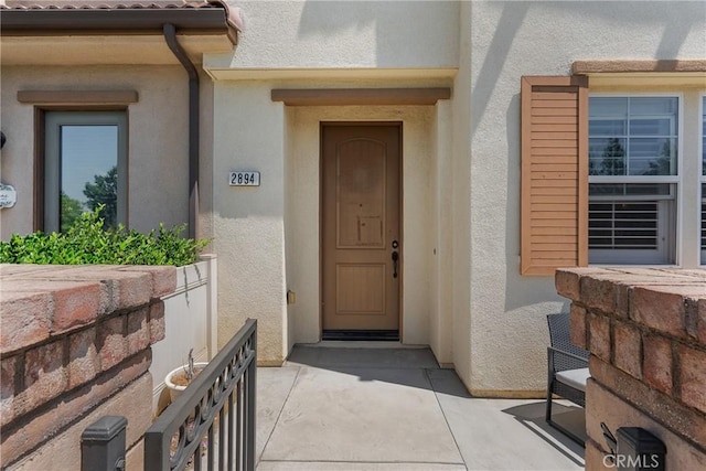 2894 E Via Fiano, Ontario, CA 91764 - property entrance featuring stucco siding