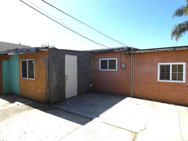 34850 Montgomery St, Chula Vista, CA 91911 - view of side of property with a patio and stucco siding