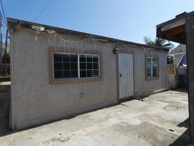 34850 Montgomery St, Chula Vista, CA 91911 - rear view of house featuring stucco siding and a patio