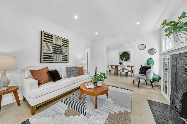 569 Lewis Ave, San Leandro, CA 94577 - living area with recessed lighting, wood finished floors, and a fireplace with flush hearth