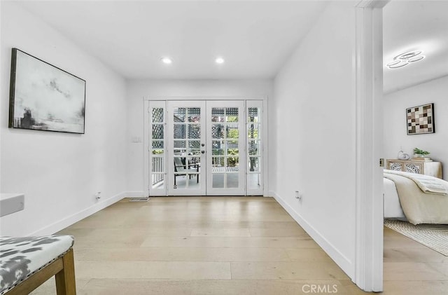 569 Lewis Ave, San Leandro, CA 94577 - unfurnished dining area featuring recessed lighting, light wood-type flooring, and french doors