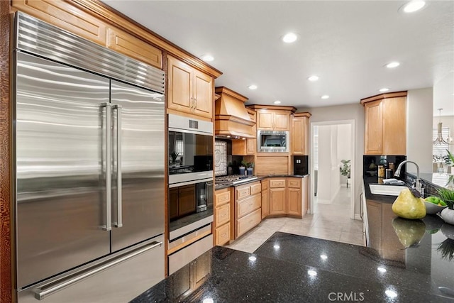 5210 Avenida De Kristine, Yorba Linda, CA 92887 - kitchen featuring built in appliances, premium range hood, decorative backsplash, recessed lighting, and dark stone countertops