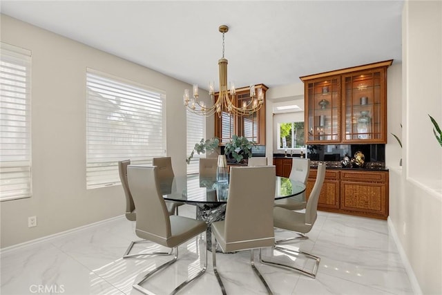 5210 Avenida De Kristine, Yorba Linda, CA 92887 - dining area featuring light marble finish floors and a chandelier