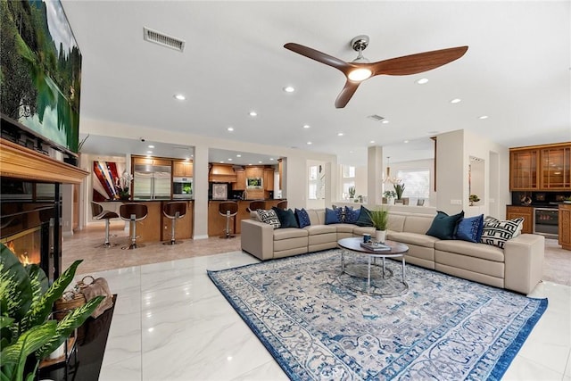 5210 Avenida De Kristine, Yorba Linda, CA 92887 - living room featuring ceiling fan, a glass covered fireplace, and recessed lighting