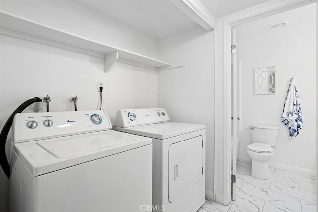 371 N Melrose Dr Unit A, Vista, CA 92083 - washroom with washer and dryer and light marble finish flooring