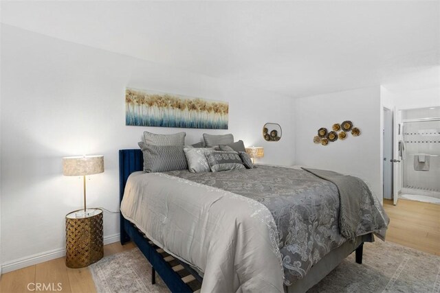 371 N Melrose Dr Unit A, Vista, CA 92083 - bedroom with wood finished floors