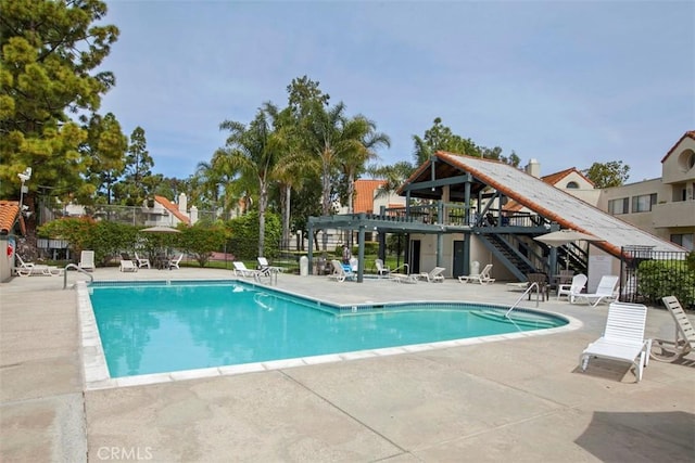 371 N Melrose Dr Unit A, Vista, CA 92083 - community pool featuring stairs, a patio area, and a pergola