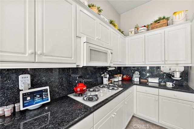 33818 Channel St, Temecula, CA 92592 - kitchen featuring white appliances, white cabinetry, and decorative backsplash
