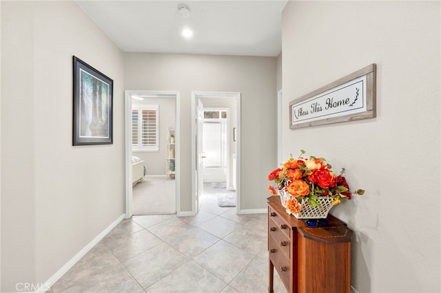 33818 Channel St, Temecula, CA 92592 - corridor featuring light tile patterned floors and baseboards