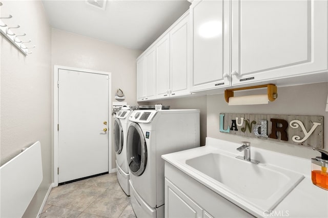 33818 Channel St, Temecula, CA 92592 - laundry room with washing machine and dryer and cabinet space