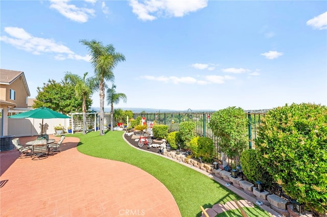 33818 Channel St, Temecula, CA 92592 - fenced backyard featuring a patio area