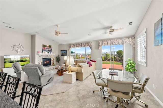 33818 Channel St, Temecula, CA 92592 - living room with ceiling fan, vaulted ceiling, a fireplace, and light tile patterned floors