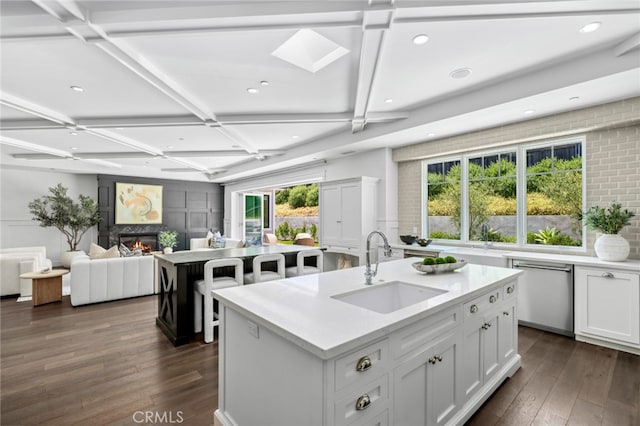 1456 Key Vw, Corona Del Mar, CA 92625 - kitchen with stainless steel dishwasher, coffered ceiling, dark wood finished floors, recessed lighting, and an island with sink