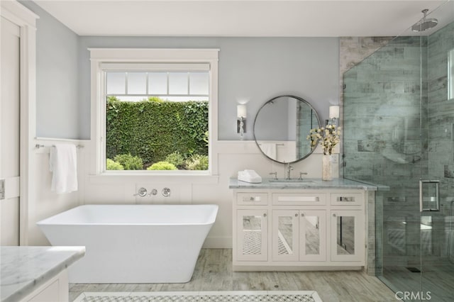 1456 Key Vw, Corona Del Mar, CA 92625 - full bath featuring vanity, a shower stall, a freestanding bath, wood finished floors, and a wainscoted wall