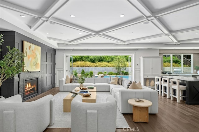 1456 Key Vw, Corona Del Mar, CA 92625 - living room with coffered ceiling, wood finished floors, a fireplace, recessed lighting, and a decorative wall