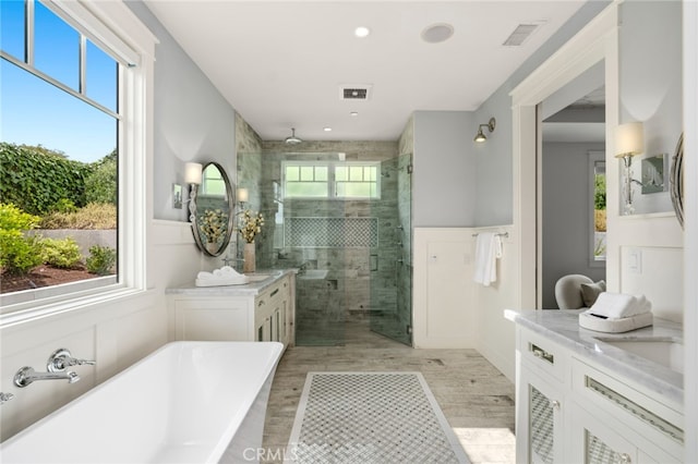 1456 Key Vw, Corona Del Mar, CA 92625 - full bathroom featuring a stall shower, vanity, a soaking tub, wood finished floors, and recessed lighting