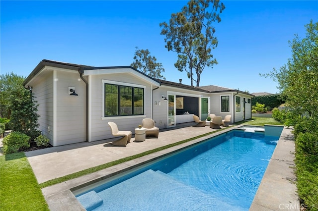 1456 Key Vw, Corona Del Mar, CA 92625 - rear view of property featuring a patio and an outdoor pool