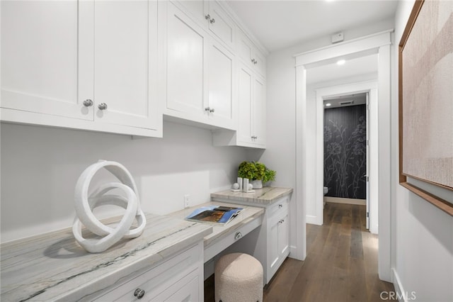 1456 Key Vw, Corona Del Mar, CA 92625 - kitchen with white cabinets, dark wood-style flooring, built in study area, and light stone counters