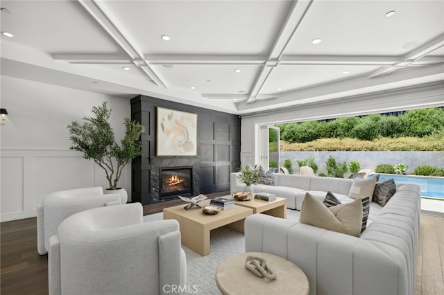 1456 Key Vw, Corona Del Mar, CA 92625 - living area with coffered ceiling, a decorative wall, wood finished floors, healthy amount of natural light, and a fireplace