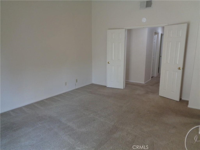 2425 Dixie St, Rosamond, CA 93560 - unfurnished bedroom featuring carpet flooring