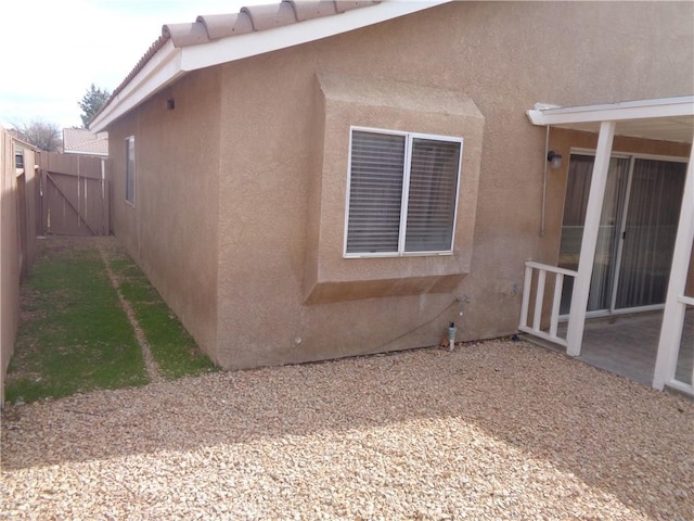 2425 Dixie St, Rosamond, CA 93560 - view of side of home with stucco siding