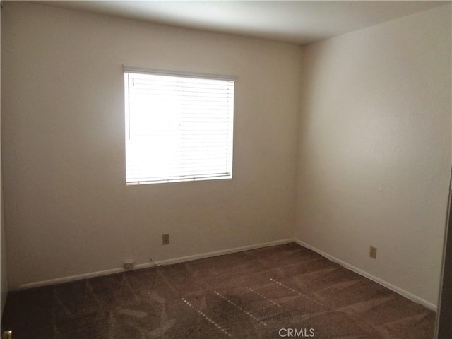 2425 Dixie St, Rosamond, CA 93560 - carpeted spare room featuring baseboards