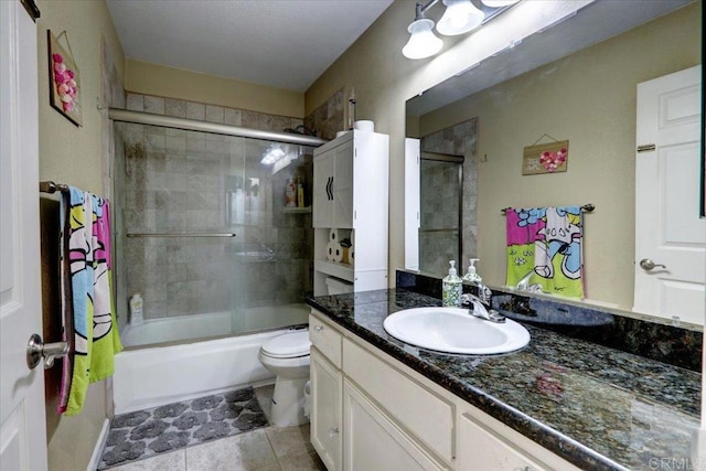 990 E Main St Unit A, El Cajon, CA 92021 - bathroom featuring vanity, enclosed tub / shower combo, and tile patterned flooring