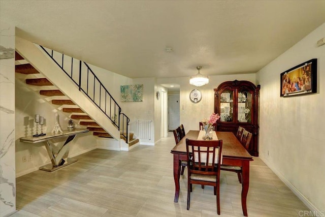 990 E Main St Unit A, El Cajon, CA 92021 - dining room featuring stairway and baseboards