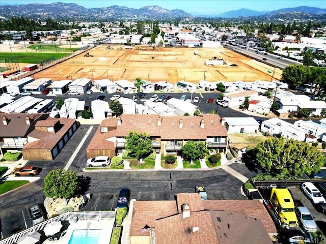 990 E Main St Unit A, El Cajon, CA 92021 - aerial overview of property's location featuring nearby suburban area and a mountainous background