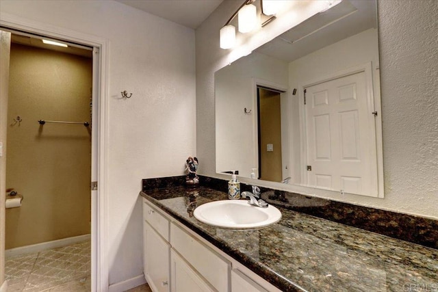 990 E Main St Unit A, El Cajon, CA 92021 - bathroom with vanity and baseboards