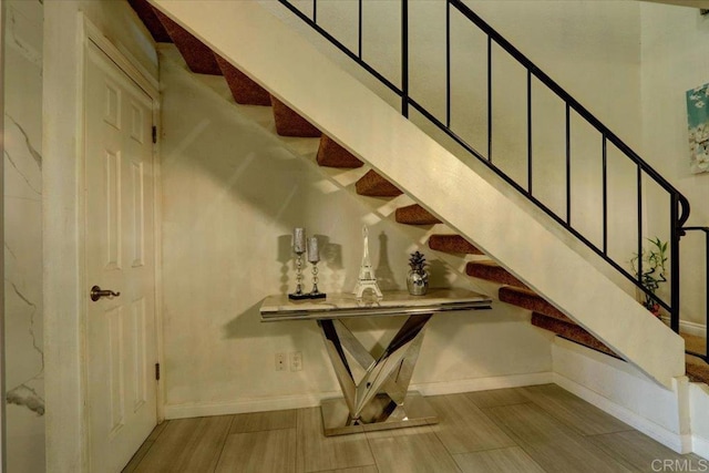 990 E Main St Unit A, El Cajon, CA 92021 - stairs featuring baseboards and wood finished floors