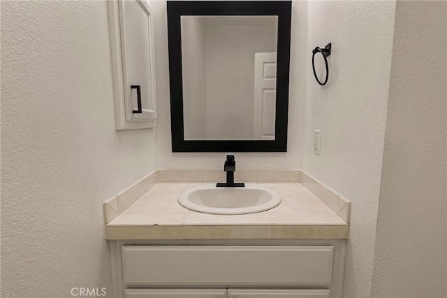 255 Sparrow Ct, Red Bluff, CA 96080 - bathroom with a textured wall and vanity
