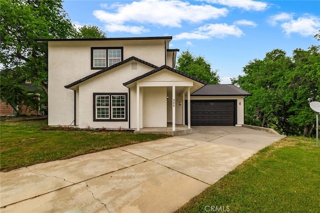 255 Sparrow Ct, Red Bluff, CA 96080 - traditional-style house featuring an attached garage, concrete driveway, stucco siding, and a front yard