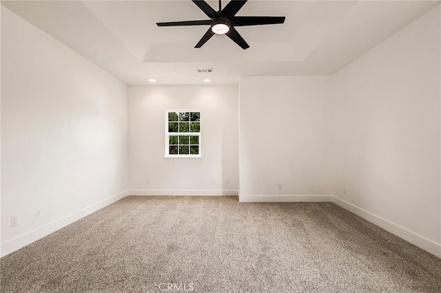 255 Sparrow Ct, Red Bluff, CA 96080 - unfurnished room with carpet flooring, a ceiling fan, recessed lighting, and a tray ceiling