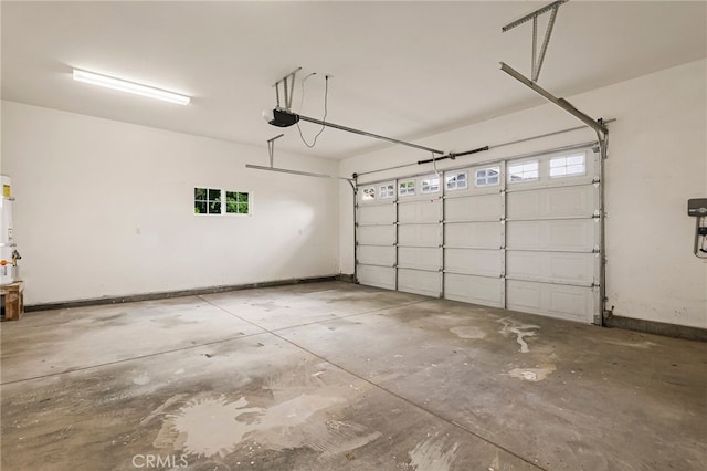 255 Sparrow Ct, Red Bluff, CA 96080 - garage with a garage door opener and baseboards