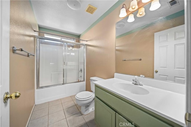 5715 Malaga Ct, Palmdale, CA 93552 - bathroom with vanity, tile patterned flooring, and combined bath / shower with glass door
