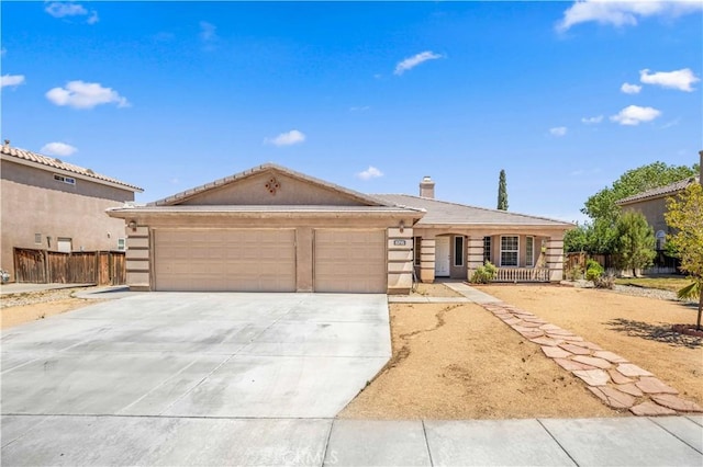 5715 Malaga Ct, Palmdale, CA 93552 - view of front facade with concrete driveway, an attached garage, a porch, and stucco siding